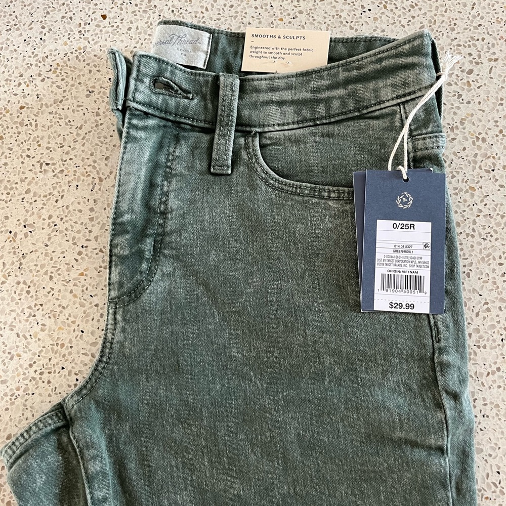 Dark faded green jeans